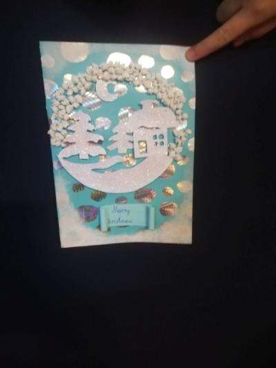 Na zdjęciu jest kartka bożonarodzeniowa