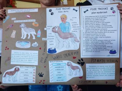 Plakat wiszący na ścianie