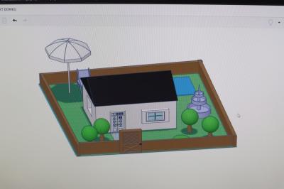 Modele domów 3D zaprogejtowane w programie Tinkercad wraz ogrodem